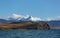 Stunning view of Pumoyongcuo in the Xizang region of China, with mountains in the background