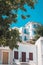 Stunning view of residential houses in pristine white in the idyllic island of Skopelos in Greece