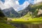 Stunning view of Seealpsee lake and the Alpstein massif