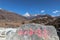 Stunning view of the Siguniang Four Sisters Mountain in Sichuan, China, the words on the stone represents the name of the