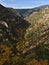 Stunning view of steep gorge Gorges de la Nesque with limestone rocks in Provence region, France on sunny day.