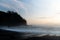 Stunning view of the sunset over a serene sandy beach in Vancouver Island