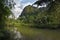 Stunning view to the karst formation hills, river with fish and