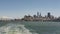 Stunning vistas of San Francisco observed from the stern of a ferryboat departing the pier, California, USA