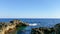 Stunning waterscape from the rocky shore of Ognina Beach, Sicily