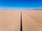 Stunning wide angle aerial drone view of the B4 desert road and a train line between LÃ¼deritz and Keetmanshoop