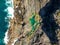 Stunning wide angle aerial drone view of the Mermaid Rock Pools and ocean waves at Matapouri Bay near Whangarei on the North Islan