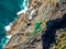 Stunning wide angle aerial drone view of the Mermaid Rock Pools and ocean waves at Matapouri Bay near Whangarei on the North Islan