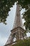 Stunning wide shot of the Eiffel Tower in detail with dramatic sky.