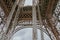 Stunning wide shot of the Eiffel Tower in detail with dramatic sky.