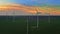 Stunning wind turbines at dusk, aerial view