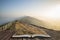 Stunning Winter sunrise landscape image of The Great Ridge in the Peak District in pages of open book, story telling concept