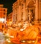Stunningly Night Scene of illuminated Trevi Fountain in the old town of Roma, Italy