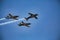 Stunt Pilot Flies Upside Down in Formation