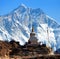 Stupa near Namche Bazar and Mount Lhotse south rock face