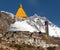 Stupa and prayer flags near Dingboche with mount Lhotse