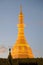 The stupa of Sule pagoda closeup in evening twilight. Yangon, Myanmar