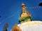 Stupa Swayambhunath with eyes and blue sky
