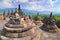 Stupas and Statue of Buddha at Borobudur Temple, Yogjakarta Indonesia.