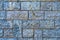 Sturdy blue and gray cut stone wall, seamless lined up