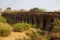 Sturdy corbeled arches of Angkor bridge,