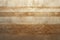 Sturdy rammed earth wall, formed from compact layers, natural tones