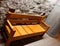 Sturdy wooden bench with arms
