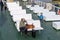 Stykkisholmur, Iceland - July 2, 2023: Ferry Baldur passengers sit on benches on the boat to sail to Flatey Island and the