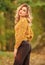 Style is all about balance. Woman wear warm sweater nature background defocused. Gorgeous lady feeling cozy in woolen