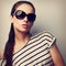 Style beautiful female model in fashion sunglasses. Retro portrait