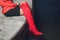 style. fashion. shoes. high women& x27;s red boots. beautiful female legs.