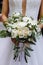 style, floral arranging, wedding concept. young woman dressed in extremely beautiful snowy white dress with puffy skirt