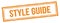 STYLE GUIDE text on orange grungy vintage stamp