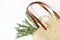 Styled stock photo. Feminine still life composition with straw French basket bag with long leather handles and