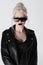 Stylish albino woman in sunglasses and