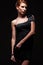 Stylish alluring model in black dress