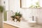 Stylish bathroom interior with countertop, mirror and houseplants