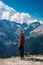 Stylish bearded man on top of a mountain. The concept of recreation and tourism. Travel