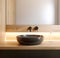 Stylish black vessel sink and faucet on wooden countertop. Interior design of modern bathroom. Created with generative AI
