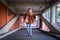 Stylish blond hair woman wearing corduroy jacket and jeans