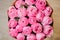 Stylish bouquet of roses rosy color close up on white background