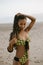 Stylish brazilian woman with dreadlocks in fashion bikini