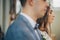 Stylish bride and groom standing during holy matrimony in church. Wedding ceremony in cathedral. Classic spiritual wedding couple