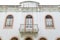 Stylish building: windows and balcony