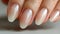 Stylish close up of elegant woman s hand with trendy white nail polish on beautiful fingernails