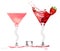 Stylish Cocktail Glasses with Strawberry Liquor Splashing isolated on White