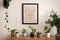 The stylish composition of cosy entryway with mock up poster, bench with plants and personal accessories. Beige wall. Home decor.