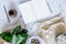 Stylish composition on the marble table with notes, zero waste neutral bags, seeds, eggs, bio vegetables and eco fruits.