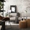 The stylish compostion at living room interior with design gray sofa, wooden coffee table, brown armchair and elegant personal