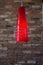 Stylish Cone Lamp Hanging Blurred Brick Wall